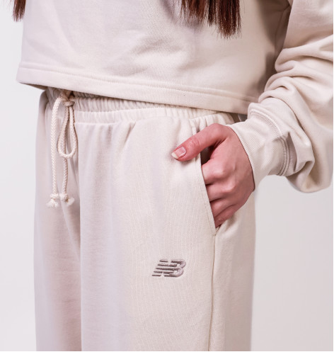 Штани жіночі New Balance Coastal Fleece Beige WP51503LIN S