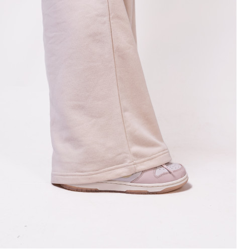 Штани жіночі New Balance Coastal Fleece Beige WP51503LIN S